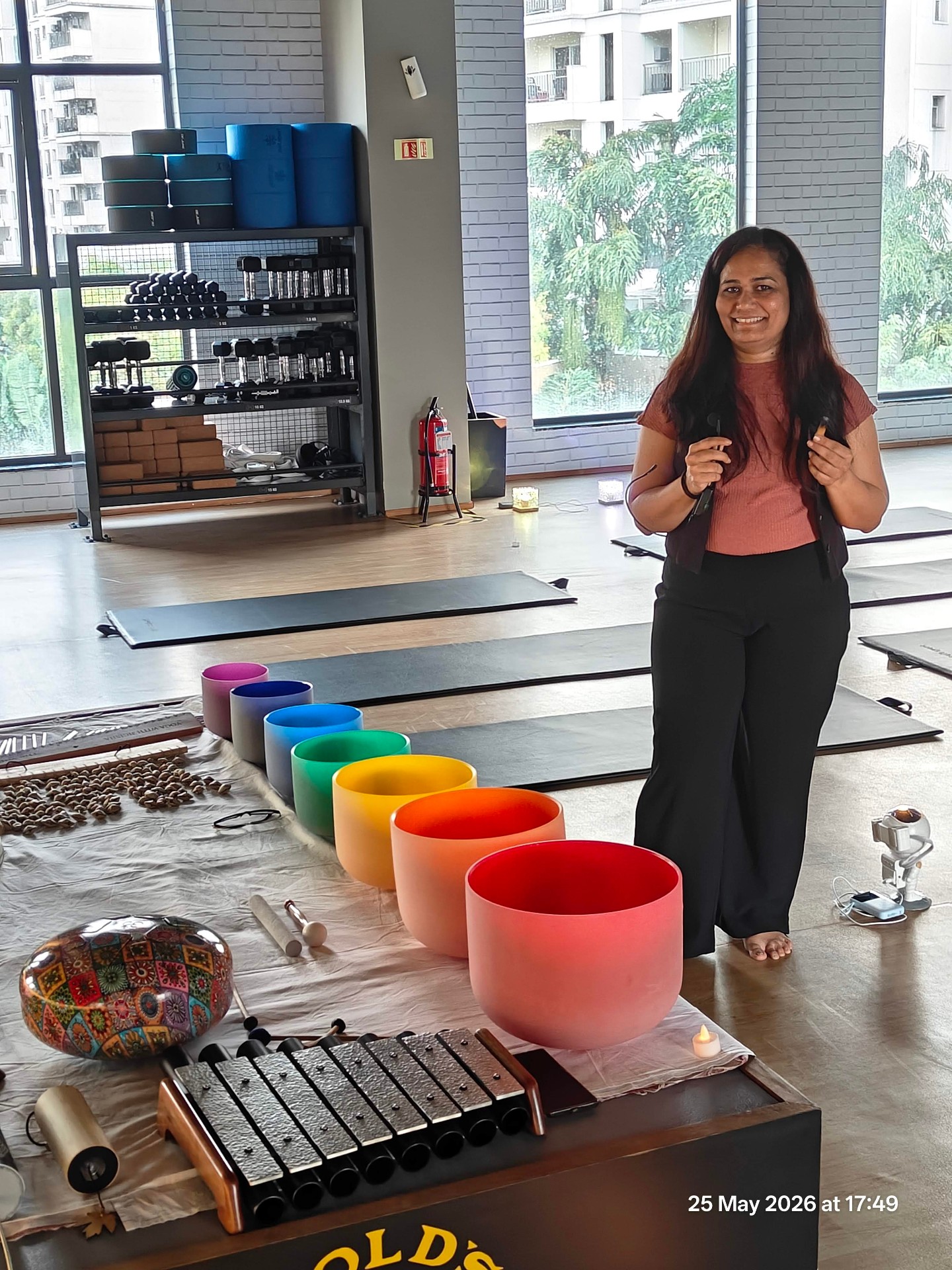 Jigisha Parikh leading Sound Healing session with 7 Chakra Crystal Singing Bowls, Xylophone, Wind Chimes and Rain Stick at Gold's Gym Bangalore - Yoga With Jigisha May 2026