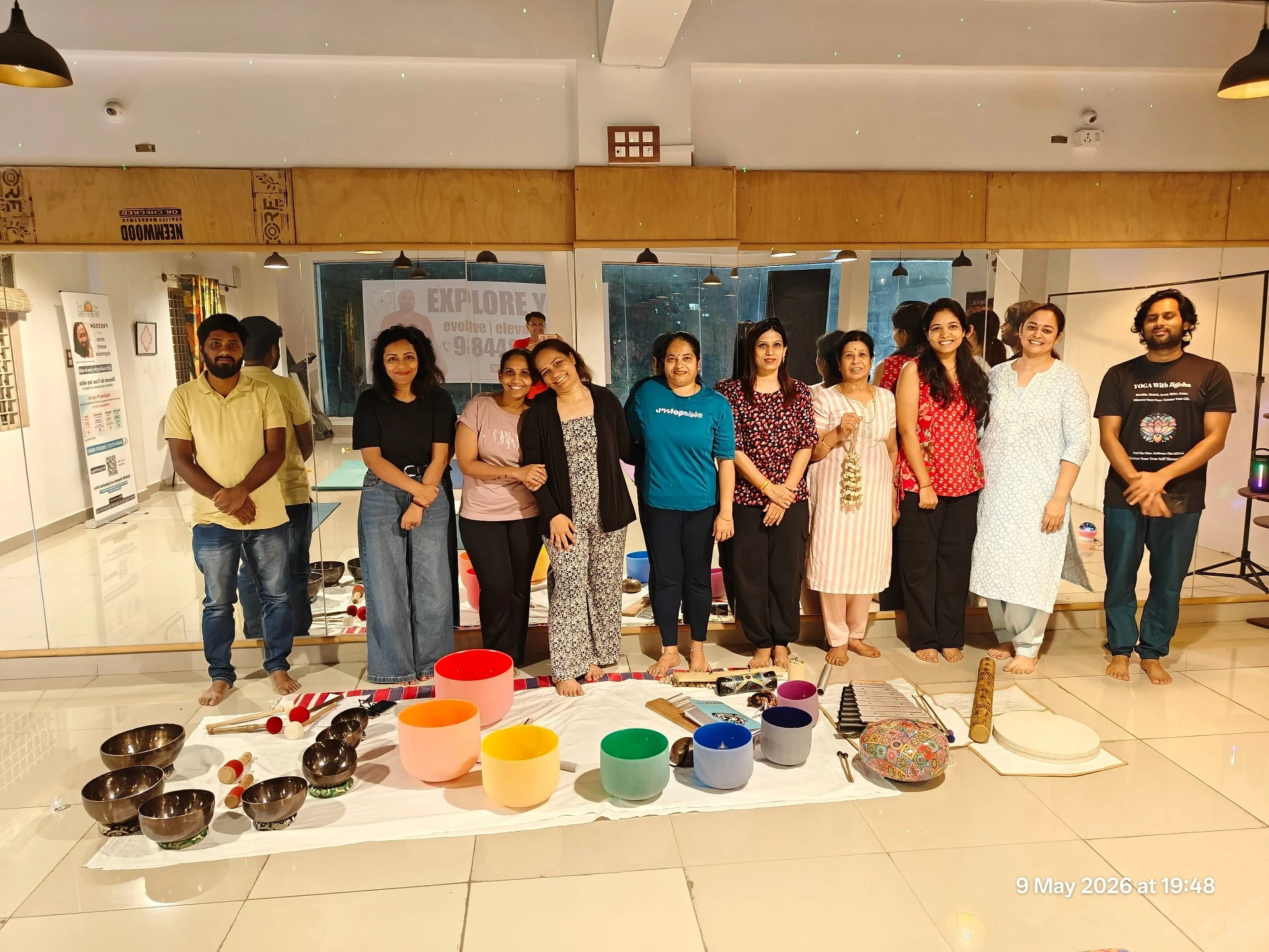 Mother's Day Sound Bath group photo with full Crystal Bowl setup in Bangalore by Yoga With Jigisha